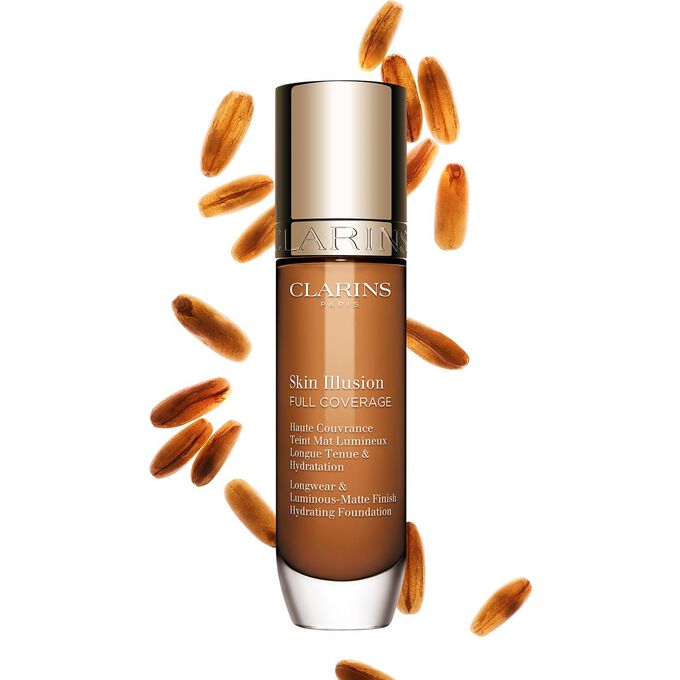 Clarins Skin Illusion Full Coverage showcasing its sleek design and vibrant packaging, the ideal foundation for a flawless & natural complexion.