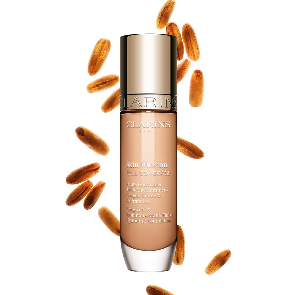 Clarins Skin Illusion Full Coverage showcasing its sleek design and vibrant packaging, the ideal foundation for a flawless & natural complexion.
