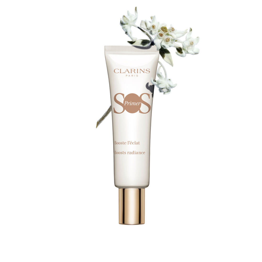 Tube of SOS Primer White by Clarins, featuring edelweiss flowers, to boost glow and increase skin luminosity.