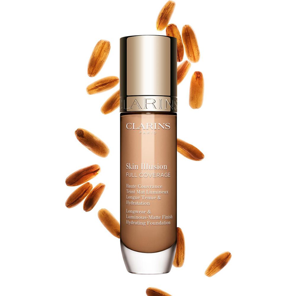 Clarins Skin Illusion Full Coverage showcasing its sleek design and vibrant packaging, the ideal foundation for a flawless & natural complexion.