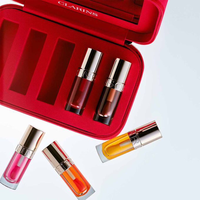 Close-up of the interior of the pouch, showcasing the different compartments holding the Lip Oils.