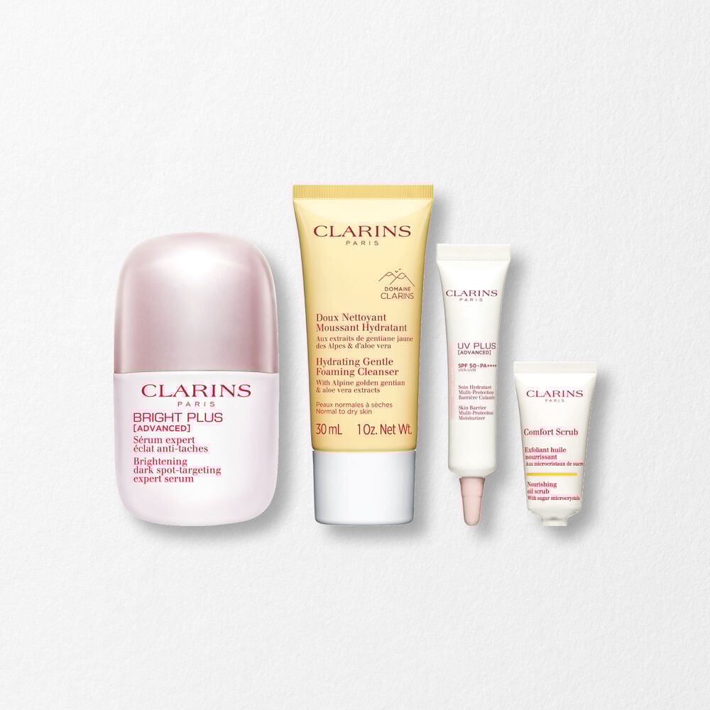 Packshot of Clarinsn anti-blemish niacinamide serum placed next to acerola fruits and a niacinamide molecule