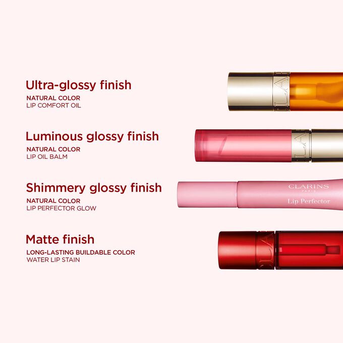 Selection of Clarins glossy lip makeup, organised by gloss finish intensity.