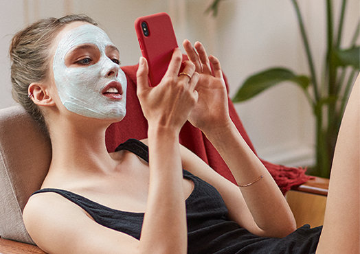 woman in Clarins face mask